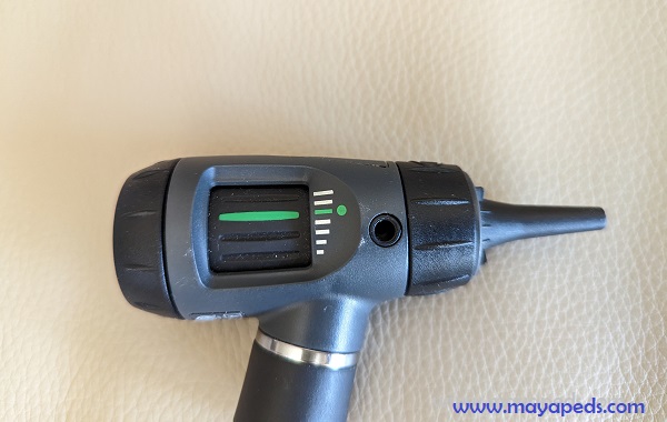 photo of an otoscope head with otoscope speculum in place. (Otoscope usually required for diagnosing earwax impaction or earwax build up)