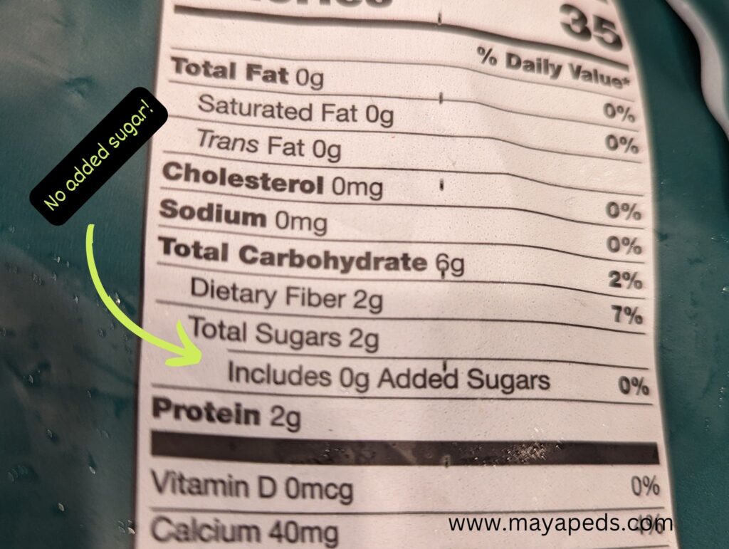 photo of a nutrition food label including the words "Includes 0g Added Sugars" A graphic saying No added sugar! has an arrow pointing to the part of the food label. www.mayapeds.com